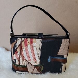 Moo Roo Black and Tan Mini Bag with Patchwork Design and Structured Shape